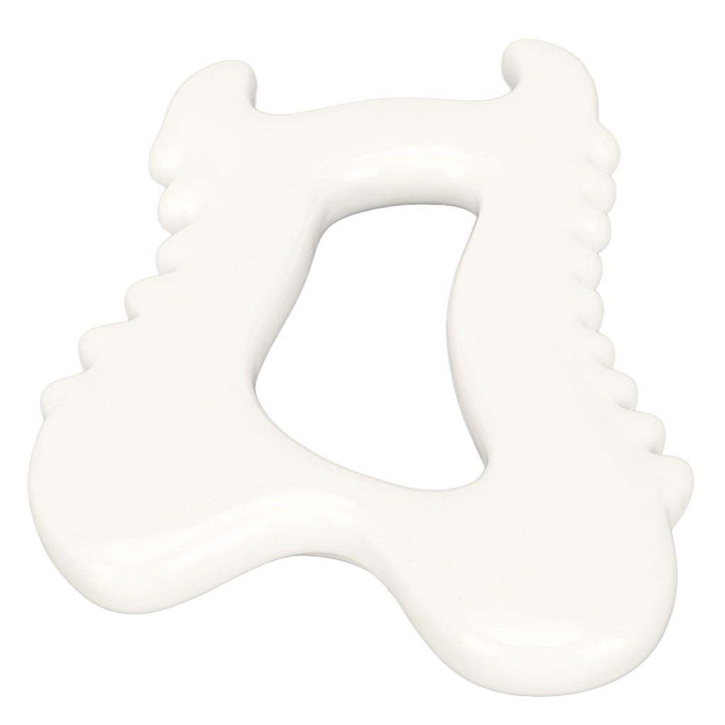 Outil blanc cassé présenté de face, avec ouverture centrale et bords crantés.